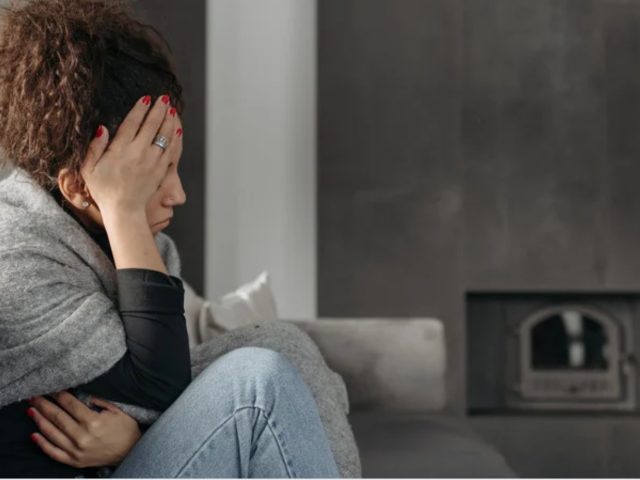 Woman with migraine